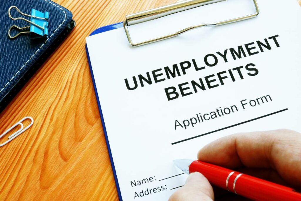 A close-up image of an unemployment benefits application form with fields to fill out.