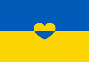 A Ukraine flag with a heart at its center to illustrate the program "Uniting for Ukraine"